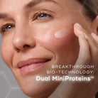 Woman applying Medik8 Liquid Peptides Advanced MP serum to her face, highlighting its breakthrough bio-technology